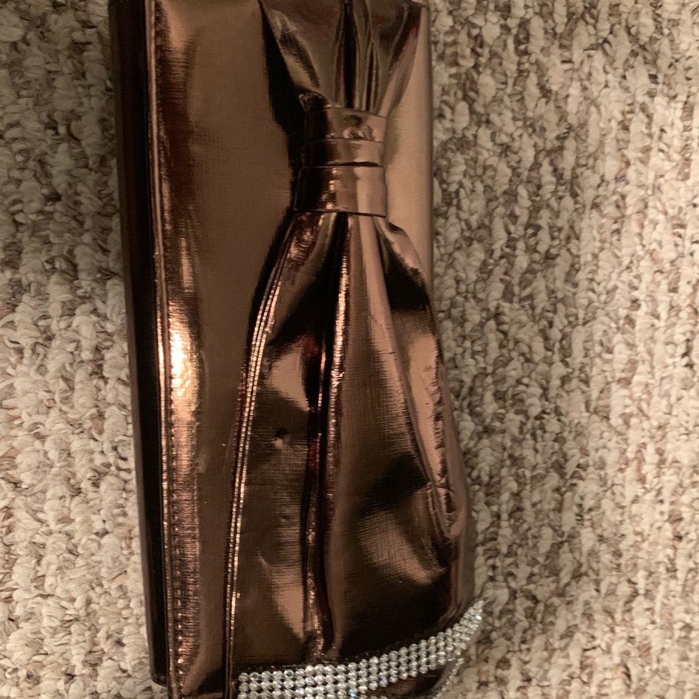 Brown shimmer clutch with strap